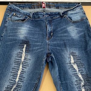 Size 18 distressed denim jeans.